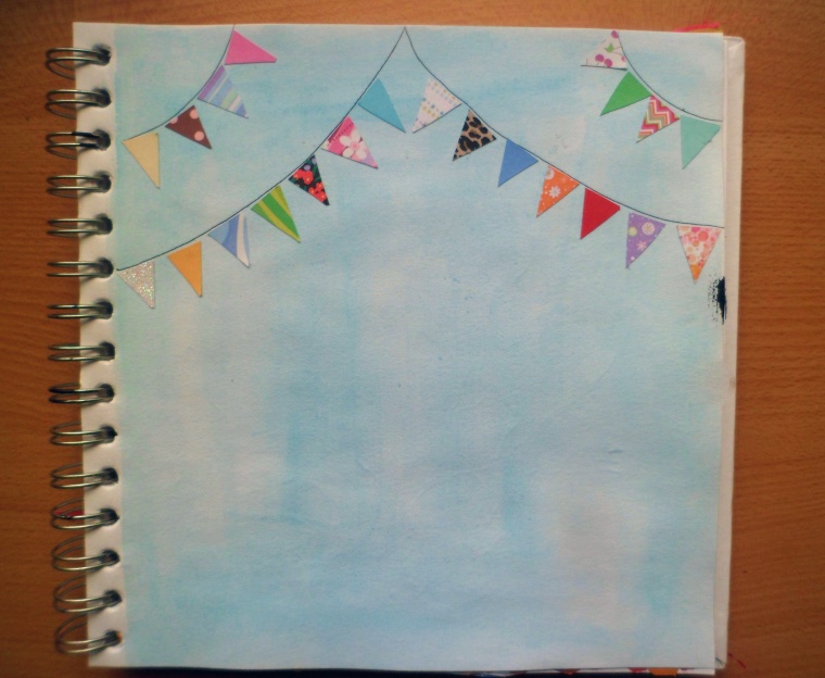 Some pretty bunting! It's not finished yet, I'm not sure what to put in the bottom half; any ideas?